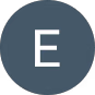 White letter E on a dark gray circular background.